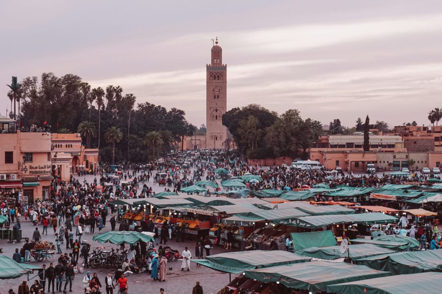 View of Marrakech’s medina with colorful souks and Koutoubia Mosque during a private 7-day Morocco tour
